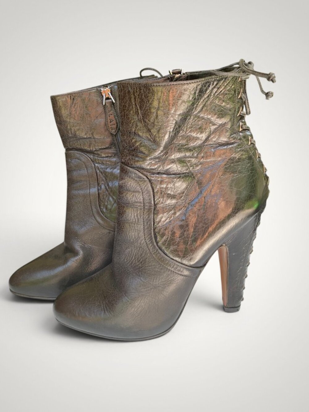Alaia black leather ankle boots with back lacing detail, Size 39